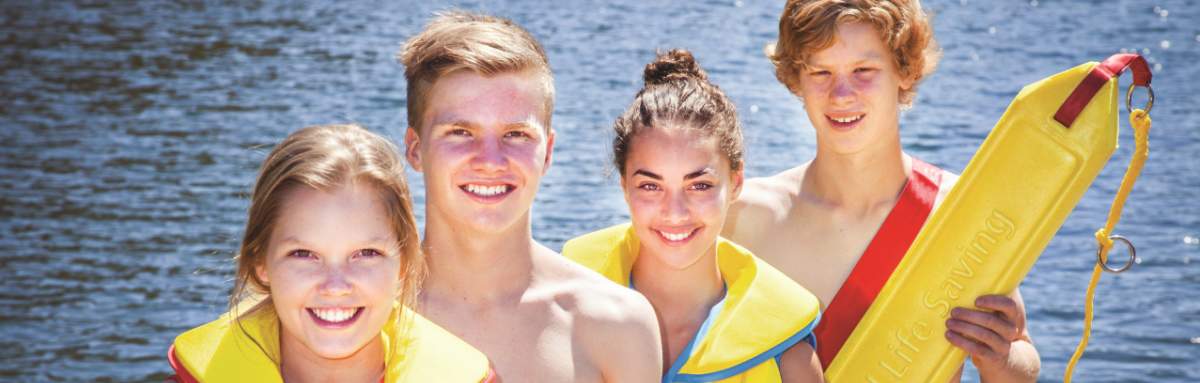 four teenagers participating in a bronze medallion course